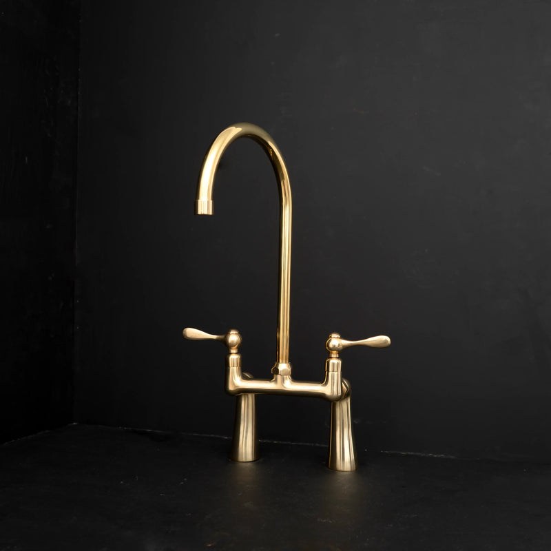 Bridge Faucet Buying Guide featuring Unlacquered Brass Bridge Kitchen Faucet Two Handle