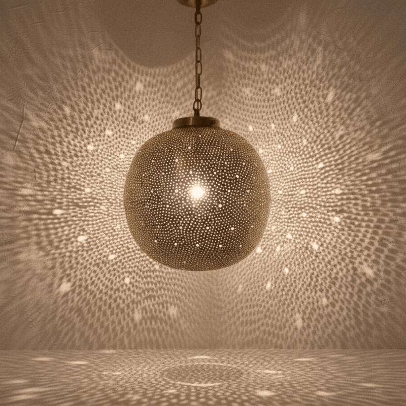 Pendant Light vs Chandelier Comparison featuring Brass Globe Pendant Light Pierced Shadow Lamp