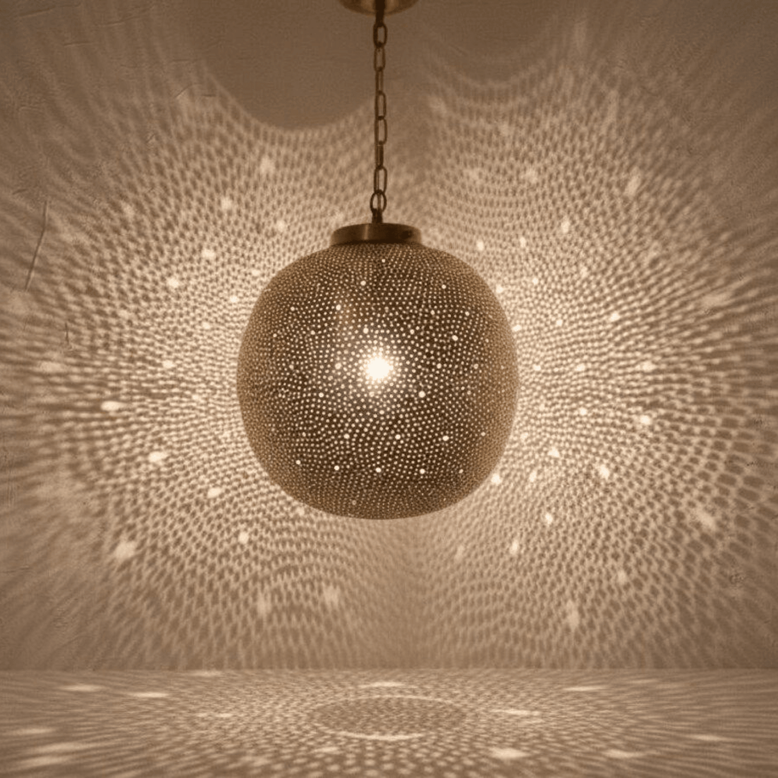 Gift Guide Brass and Copper Pieces for a New Home featuring Brass Globe Pendant Light