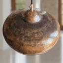Rustic copper dome pendant close-up, oxidized surface texture – Brass For Homes