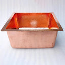 Hammered copper kitchen island sink – top-down view showing bowl depth