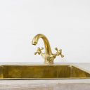 Unlacquered brass single hole bathroom faucet – brushed finish, front view