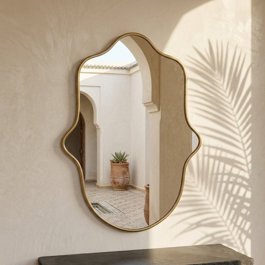 The Hamsa - Hand-Forged Solid Unlacquered Brass Mirror wall mirror for bathrooms, entryways, dressing rooms, and decorative wall styling - view 1
