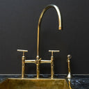 Unlacquered brass 3-hole bridge kitchen faucet with lever handles, front view – Brass For Homes