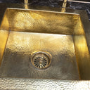 Hammered brass bar sink – natural brass patina finish